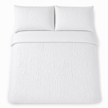 Overhead flat lay of the Luana White duvet cover set with two matching pillowcases