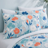 Close-up of Luna duck egg floral pillowcases showing blue coral and white flower print