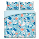 Overhead flat lay of the Luna duck egg floral duvet cover set with two pillows