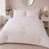 Margot Polycotton Duvet Cover Set in pink styled on a coordinated bedroom bed