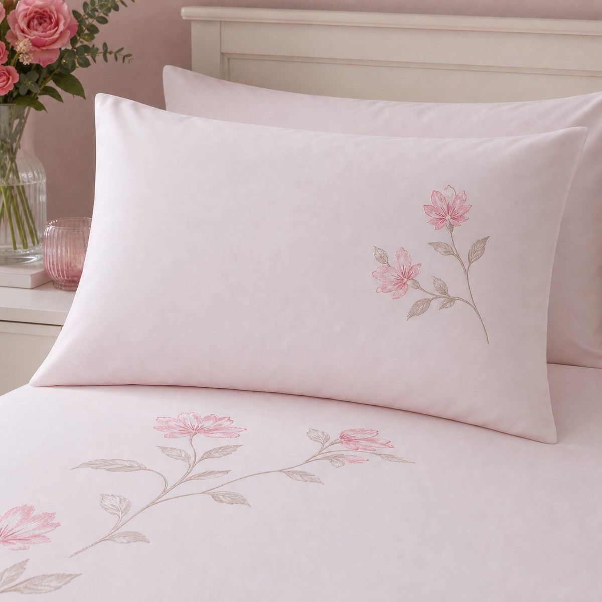 Close-up of Margot Polycotton Duvet Cover Set in pink pillowcases showing the print and fabric detail