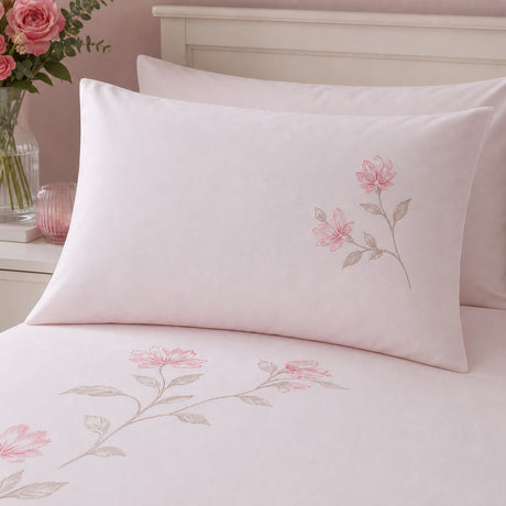 Close-up of Margot Polycotton Duvet Cover Set in pink pillowcases showing the print and fabric detail