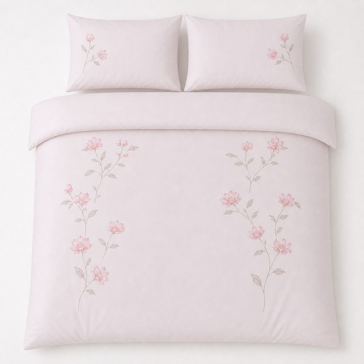 Overhead flat lay of the Margot Polycotton Duvet Cover Set in pink with two matching pillowcases