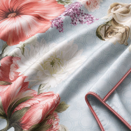 Macro close-up of Mayfair Lady blue cotton sateen fabric with floral print and subtle ring pattern