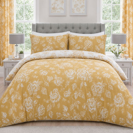 Mishka Reversible Floral Gold Polycotton Duvet Cover Set styled on a bed in a coordinated bedroom lifestyle scene