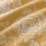 Macro close-up of the polycotton fabric on the Mishka Reversible Floral Gold Polycotton Duvet Cover Set