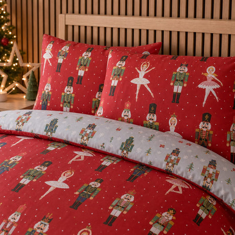 Close-up of matching Nutcracker Red Christmas Polycotton Duvet Cover Set pillowcases showing the pattern and fabric detail
