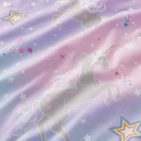 Macro close-up of the Ombre Unicorn lilac kids duvet cover fabric with pastel unicorn detail