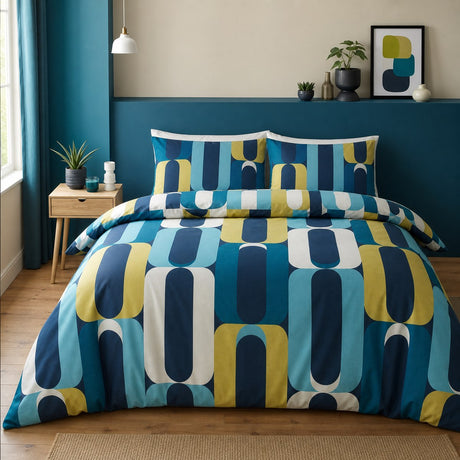 Orea blue geometric polycotton duvet cover set styled on a contemporary bedroom bed
