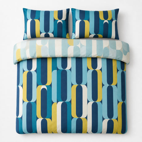 Overhead flat lay of the Orea blue reversible duvet cover set showing the lighter folded reverse side