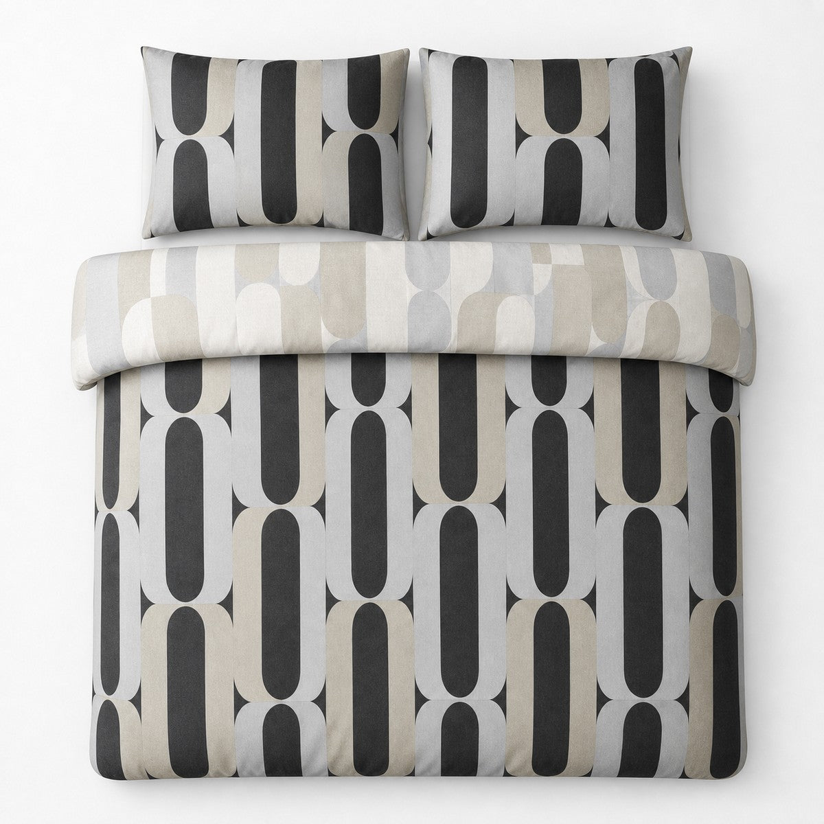 Overhead flat lay of the Orea charcoal reversible duvet cover set showing the lighter folded reverse side