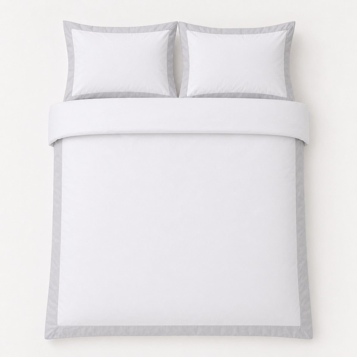 Overhead flat lay of the Oxford Edge 100% Cotton White Duvet Cover Set with two matching pillowcases
