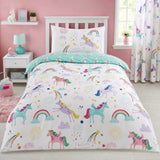 Rainbow Unicorn Kids Duvet Cover Set styled on a bed in a coordinated bedroom lifestyle scene