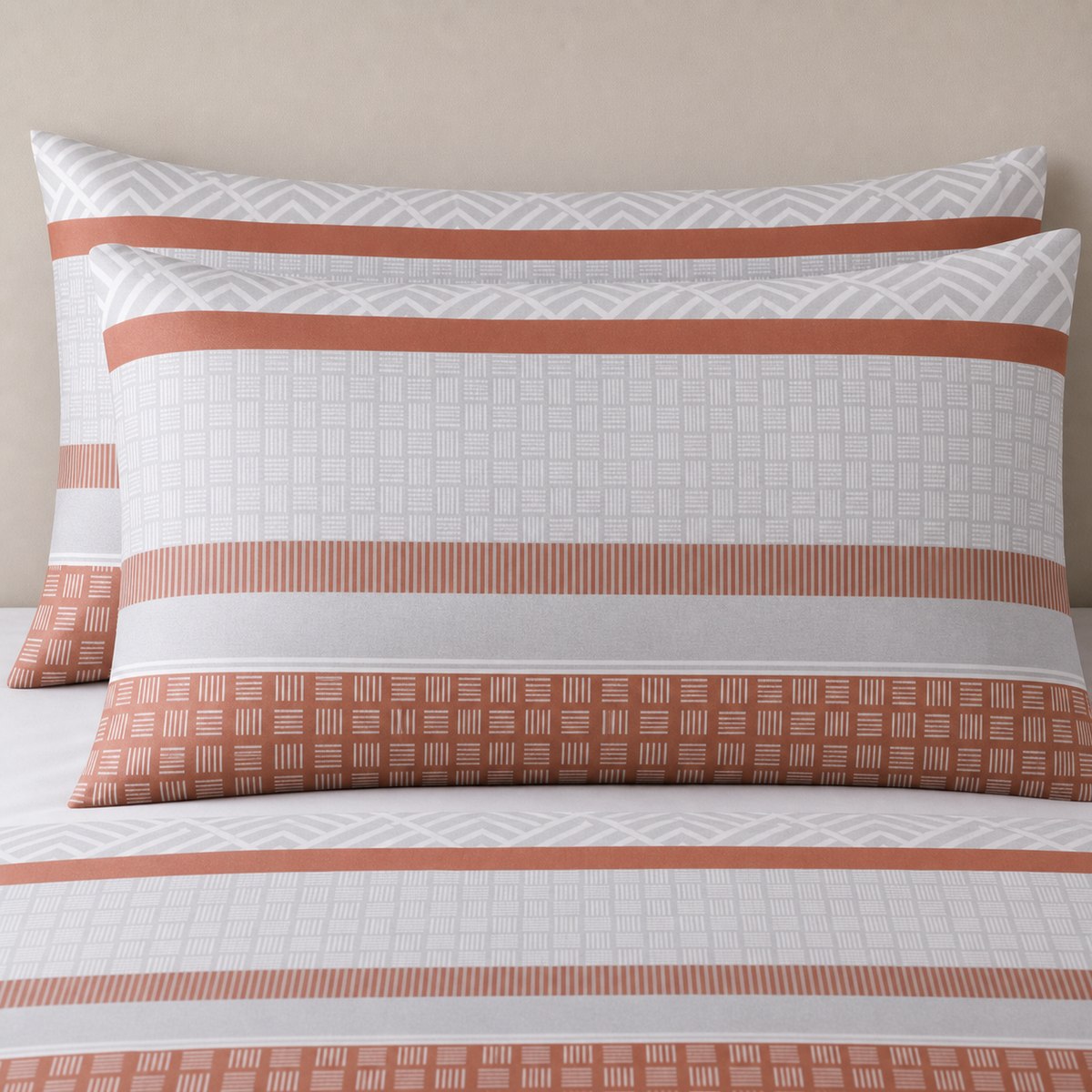 Close-up of Rico Polycotton Duvet Cover Set in natural pillowcases showing the print and fabric detail