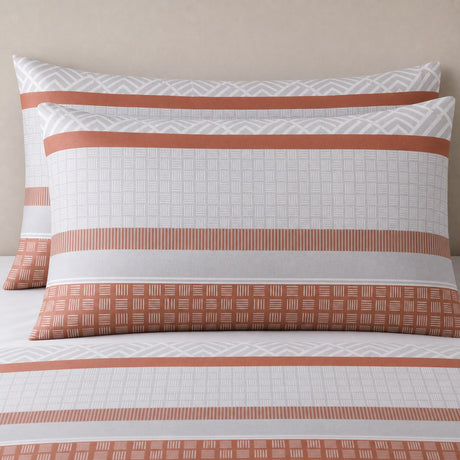 Close-up of Rico Polycotton Duvet Cover Set in natural pillowcases showing the print and fabric detail