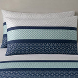 Close-up of Rico Polycotton Duvet Cover Set in teal pillowcases showing the print and fabric detail