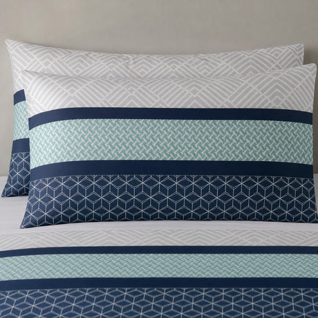 Close-up of Rico Polycotton Duvet Cover Set in teal pillowcases showing the print and fabric detail