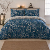 Rohan 100% Cotton Duvet Cover Set in blue styled on a coordinated bedroom bed