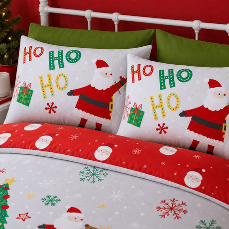 Close-up of Santa Please Stop Here Christmas pillowcases with readable Ho Ho Ho lettering