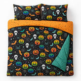 Overhead flat lay of the Scary Pumpkins Halloween Microfibre Duvet Cover Set with two matching pillowcases