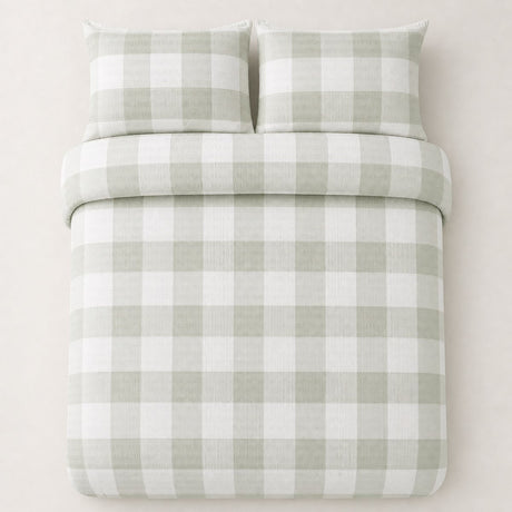 Overhead flat lay of the Seersucker Gingham green duvet cover set with two matching pillowcases