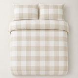 Overhead flat lay of the Seersucker Gingham natural duvet cover set with two matching pillowcases