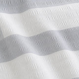 Macro close-up of the Seersucker Gingham silver polycotton seersucker fabric