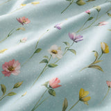 Macro close-up of Serenity duck egg floral cotton duvet cover fabric