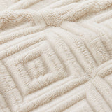 Macro close-up of the natural Romo microfibre fleece fabric with raised diamond pattern