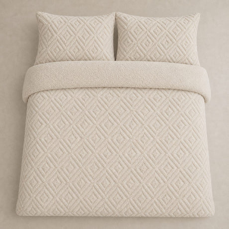 Overhead flat lay of the natural Romo fleece duvet cover set with two matching pillowcases
