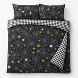Overhead flat lay of the Spiders Grey Halloween Microfibre Duvet Cover Set with two matching pillowcases