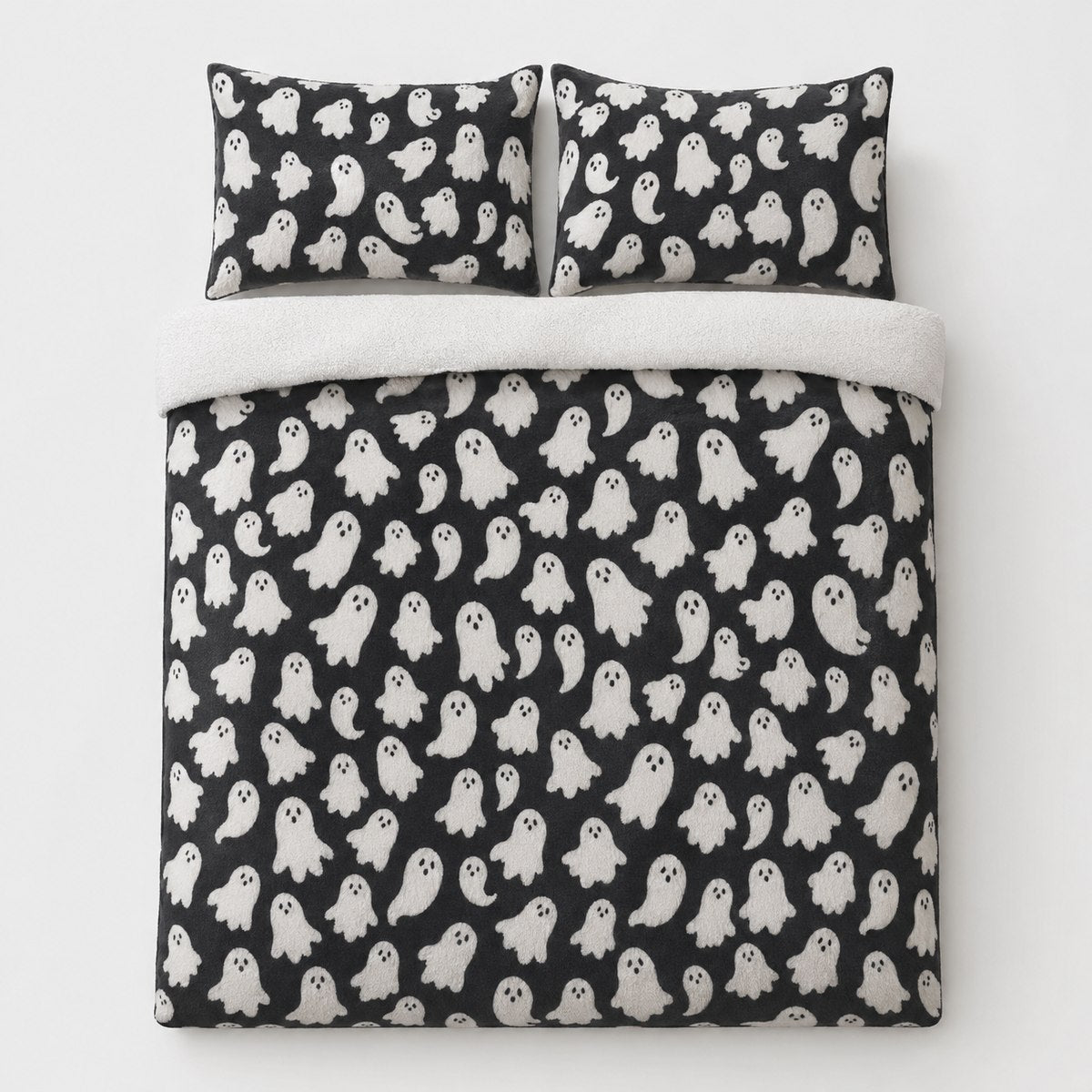 Overhead flat lay of the Spooky Ghosts Halloween Microfibre Duvet Cover Set with two matching pillowcases