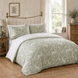 Spring Rabbits green reversible duvet cover set styled on a soft country bedroom bed