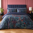 Tessa Floral Navy 200 Thread Count Cotton Duvet Cover Set styled on a bed in a coordinated bedroom lifestyle scene