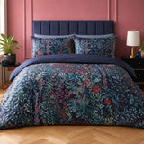 Tessa Floral Navy 200 Thread Count Cotton Duvet Cover Set styled on a bed in a coordinated bedroom lifestyle scene