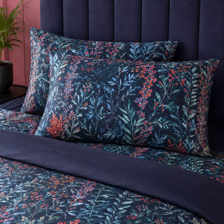 Close-up of matching Tessa Floral Navy 200 Thread Count Cotton Duvet Cover Set pillowcases showing the pattern and fabric detail