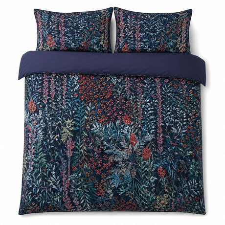 Overhead flat lay of the Tessa Floral Navy 200 Thread Count Cotton Duvet Cover Set with two matching pillowcases