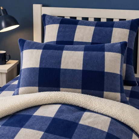 Close-up of matching Theo Check Cosy Blue Duvet Cover Set pillowcases showing the pattern and fabric detail