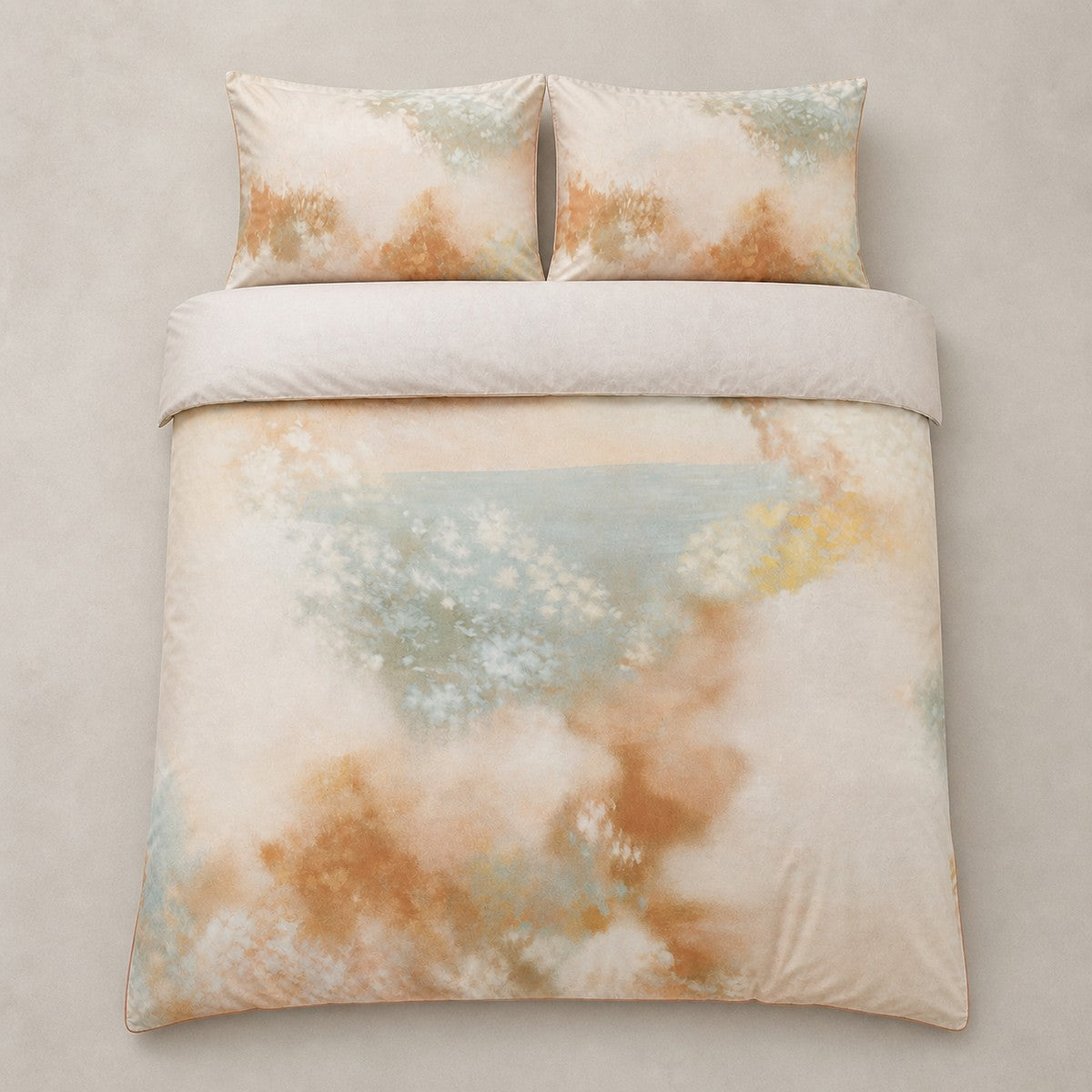 Overhead flat lay of the Tuscany Cotton Duvet Cover Set in natural with two matching pillowcases