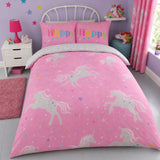 Unicorn Glow In The Dark Kids Duvet Cover Set styled on a bed in a coordinated bedroom lifestyle scene