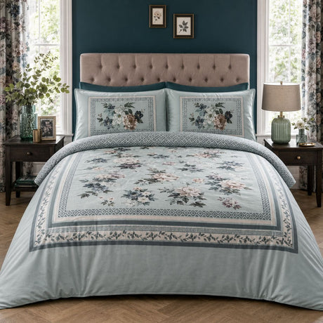 Windsford pale blue cotton sateen floral border duvet cover set styled in an elegant bedroom