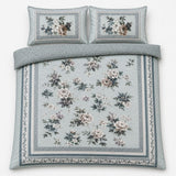Overhead flat lay of the Windsford floral cotton sateen duvet cover set with two pillows