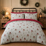 Winter Robin Duck Egg Microfibre Christmas Duvet Cover Set styled on a bed in a coordinated bedroom lifestyle scene